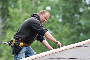 a roof patch job being performed by a San Mateo handyman