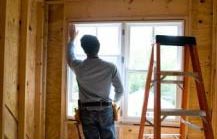 a new window being installed in a remodel